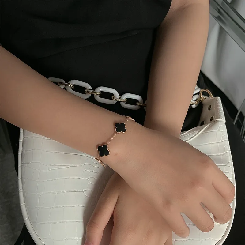 Four-Leaf Clover & Five-Flower Charm Bracelet - Image 2